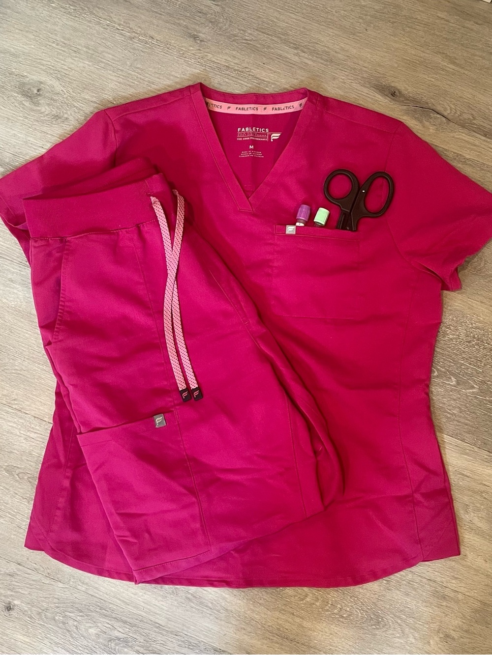 Fabletics Women's Short Sleeve V-Neck Scrub Top and Pants Set in Magenta